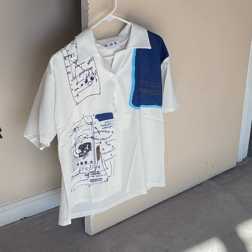 White graphic button-up short sleeve shirt
